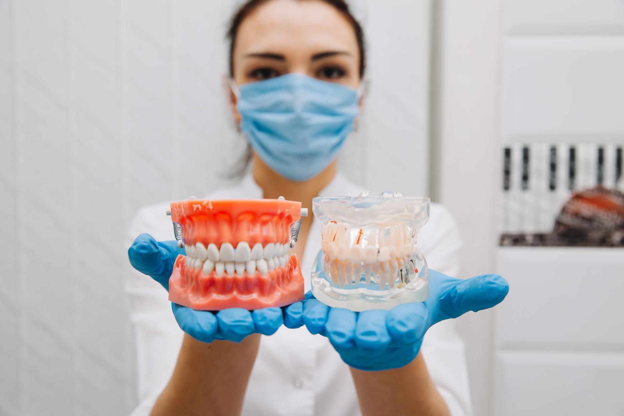 your-guide-to-false-teeth-types-pros-cons-costs-more